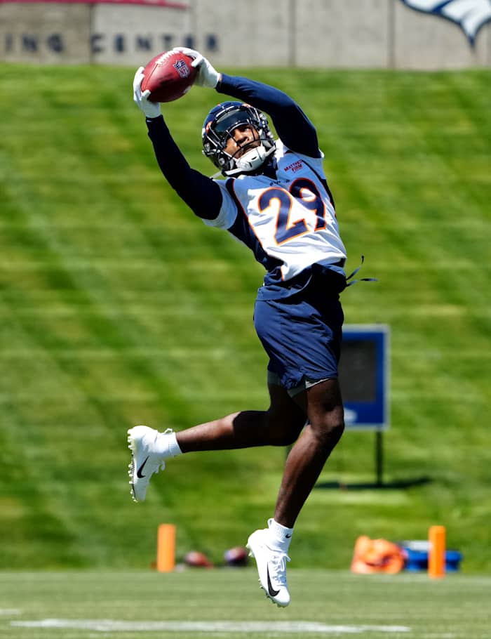 Rookie cornerback Faion Hicks catching a ball in rookie mini-camp (Credit: Ron Chenoy-USA TODAY Sports)